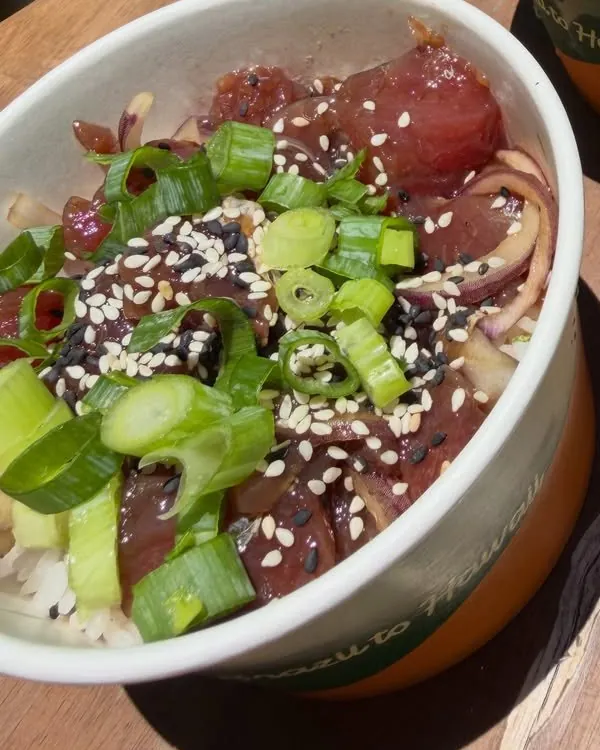 Ahi poke bowl with green onion and sesame